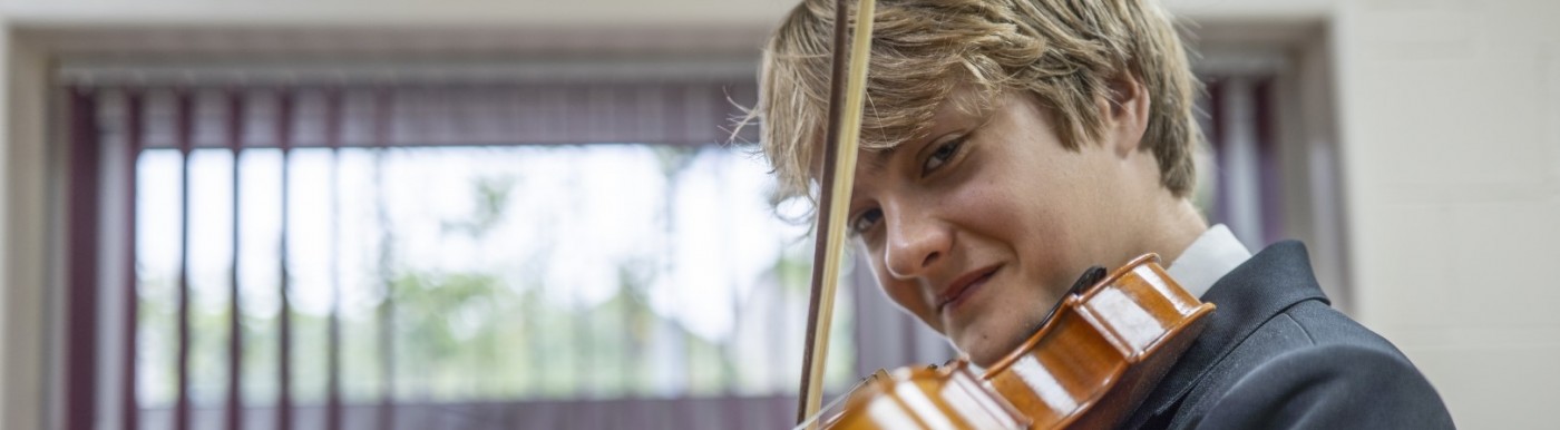 Student playing violin