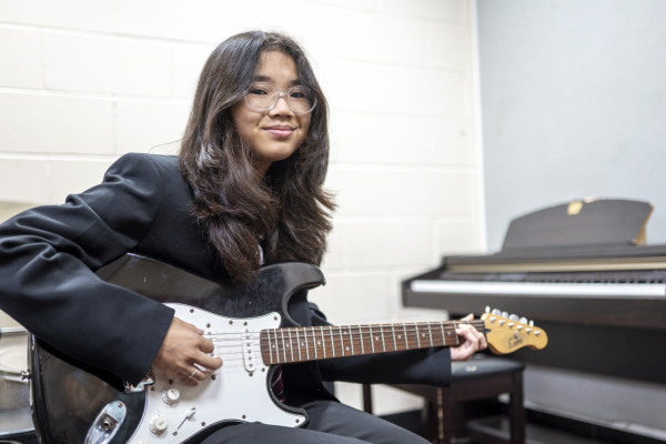 Girl Playing guitar